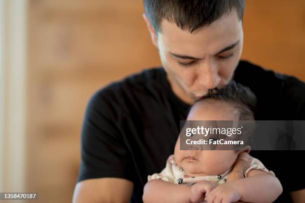 indigenous father bonding with his daughter - native american family stock pictures, royalty-free photos & images