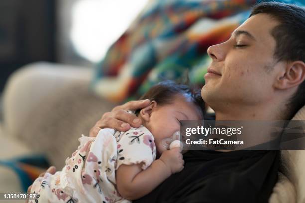 Dad Rocking Baby Photos and Premium High Res Pictures - Getty Images