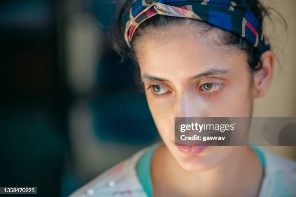 portrait of a young woman contemplates. - lightskinned stock pictures, royalty-free photos & images