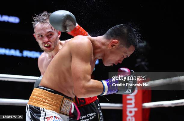 Sunny Edwards of United Kingdom punches Jayson Mama of Philippines during the IBF World flyweight title fight between Sunny Edwards and Jayson Mama...