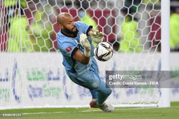 Rais Mbolhi of Algeria saves Morocco's fourth penalty in the penalty shootout, missed by Karim El Berkaoui of Morocco during the FIFA Arab Cup Qatar...