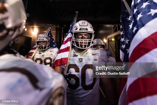 Connor Finucane of the Army Black Knights prepares to take the field before the start of a game against the Navy Midshipmen at MetLife Stadium on...