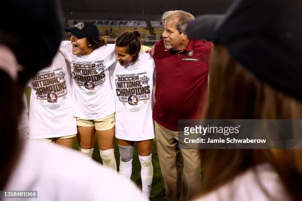 Head Coach Mark Krikorian of the Florida State Seminoles talk with his team after their victory over the BYU Cougars during the Division I Womens...