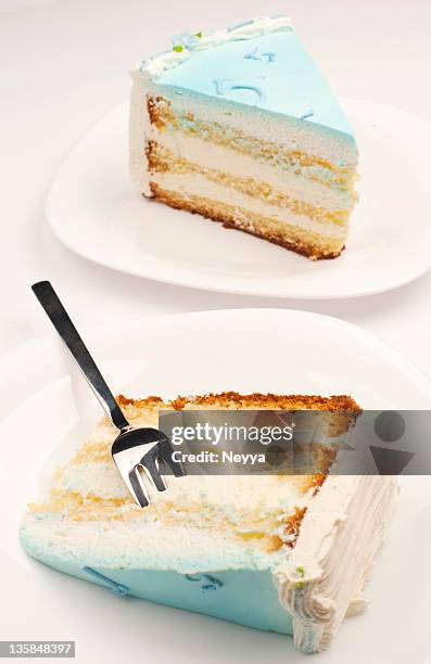 blue birthday cake - slice of cake isolated stock pictures, royalty-free photos & images