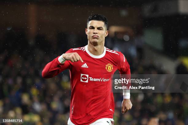 Cristiano Ronaldo of Manchester United celebrates after scoring his sides first goal from the penalty spot during the Premier League match between...