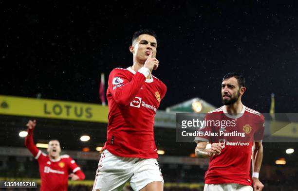Cristiano Ronaldo of Manchester United celebrates after scoring his sides first goal from the penalty spot during the Premier League match between...