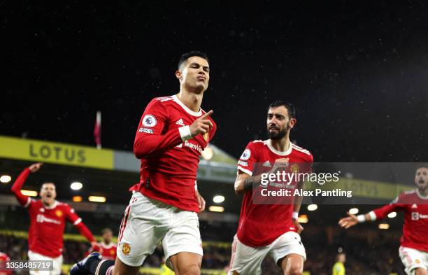 Cristiano Ronaldo of Manchester United celebrates after scoring his sides first goal from the penalty spot during the Premier League match between...