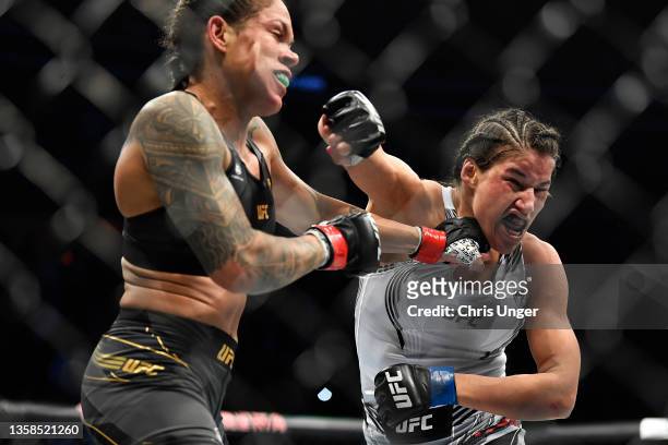 Amanda Nunes of Brazil fights Julianna Pena in their UFC bantamweight championship bout during the UFC 269 on December 11, 2021 in Las Vegas, Nevada.