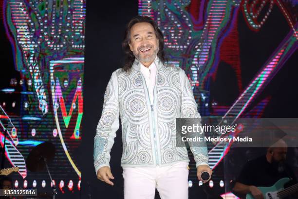 Marco Antonio Solís 'El Buki' performs on stage during a concert at Arena Ciudad de Mexico on December 11, 2021 in Mexico City, Mexico.