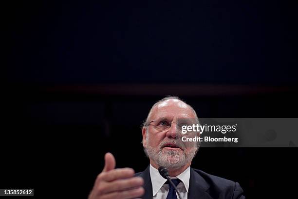 Jon S. Corzine, former chairman and chief executive officer of MF Global Holdings Ltd., testifies during a House Financial Services Committee in...