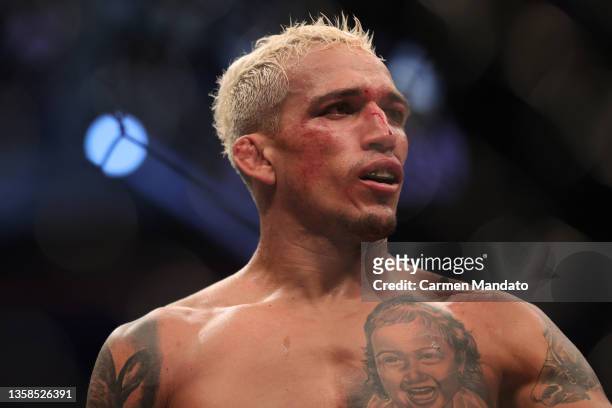Charles Oliveira of Brazil looks on in his lightweight title fight against Dustin Poirier during the UFC 269 event at T-Mobile Arena on December 11,...