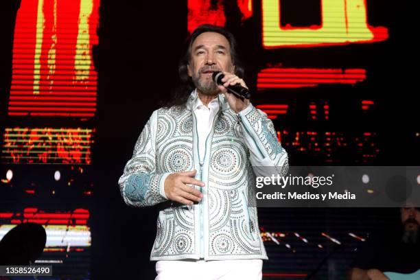 Marco Antonio Solís 'El Buki' performs on stage during a concert at Arena Ciudad de Mexico on December 11, 2021 in Mexico City, Mexico.