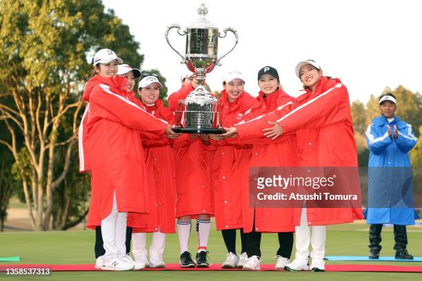 Mone Inami, Mao Saigo, Yuna Nishimura, Minami Katsu, Sakura Koiwai, Erika Kikuchi and Erika Hara of Japan pose with the trophy after winning the...
