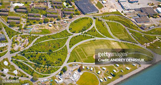green city. aerial view. river. concept. governors island - social rehabilitation centre stock pictures, royalty-free photos & images