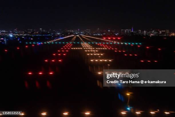 tokyo haneda international airport in tokyo of japan - airplane lights stock pictures, royalty-free photos & images