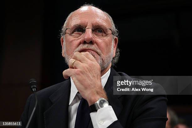 Former chairman and CEO of MF Global and former New Jersey Governor Jon Corzine testifies during a hearing before the Oversight and Investigations...