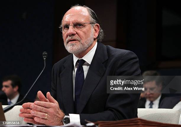Former chairman and CEO of MF Global and former New Jersey Governor Jon Corzine testifies during a hearing before the Oversight and Investigations...