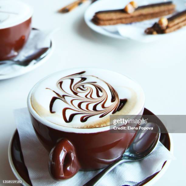 latte art coffee cup - coffee art stockfoto's en -beelden