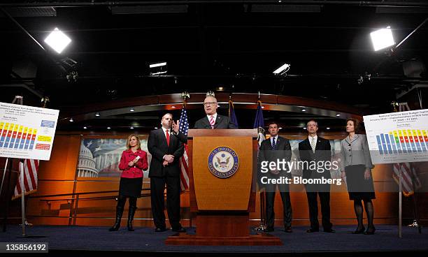 Representative Howard P. "Buck" McKeon, a Republican from California and chairman of the House Armed Services Committee, speaks at a news conference...
