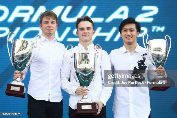 Champion Oscar Piastri of Australia and Prema Racing, Vice Champion Robert Shwartzman of Russia and Prema Racing and 3rd placed Guanyu Zhou of China...