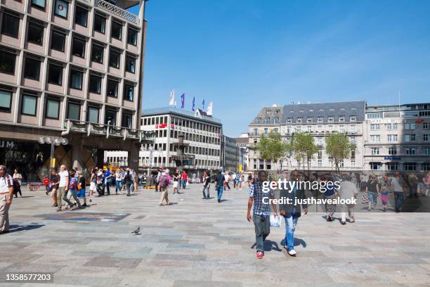 pedestrians on square domkloster in cologne - pedestrian zone stock pictures, royalty-free photos & images