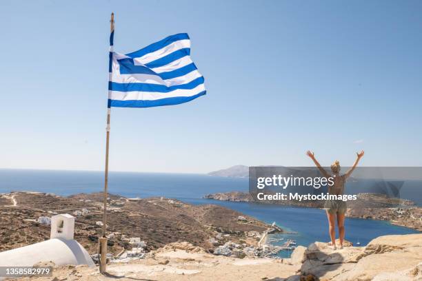 young woman visiting a greek island in summer on a sunny day - ios grécia imagens e fotografias de stock