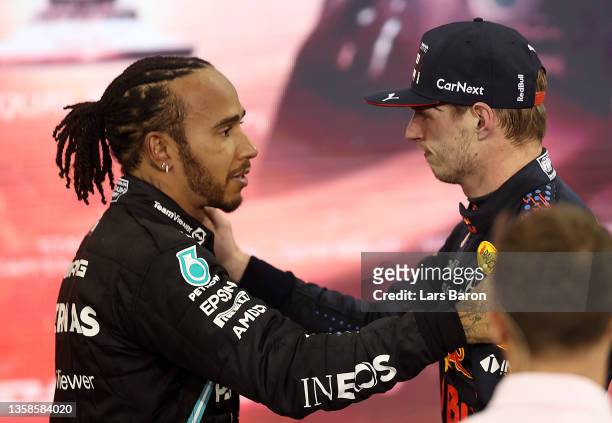 Race winner and 2021 F1 World Drivers Champion Max Verstappen of Netherlands and Red Bull Racing is congratulated by runner up in the race and...