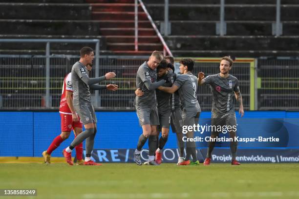 Marco Schikora of FSV Zwickau celebrates after scoring his team`s second goal with teammates during the 3. Liga match between Würzburger Kickers and...