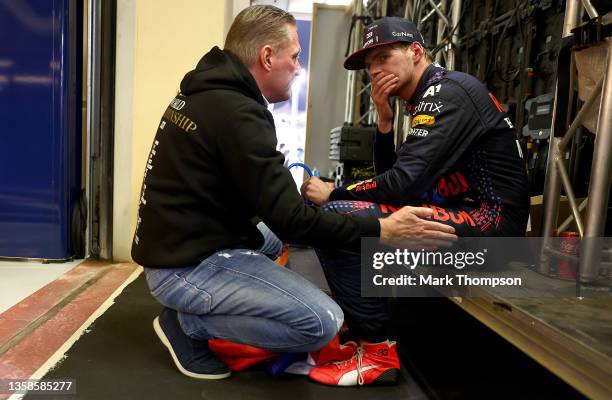 Race winner and 2021 F1 World Drivers Champion Max Verstappen of Netherlands and Red Bull Racing celebrates with his father Jos Verstappen in parc...