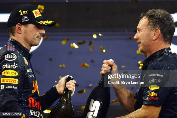 Race winner and 2021 F1 World Drivers Champion Max Verstappen of Netherlands and Red Bull Racing celebrates with Red Bull Racing Team Principal...