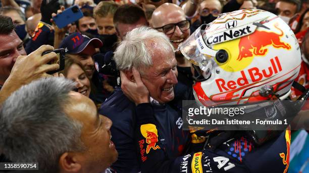 Race winner and 2021 F1 World Drivers Champion Max Verstappen of Netherlands and Red Bull Racing celebrates with Red Bull Racing Team Consultant Dr...