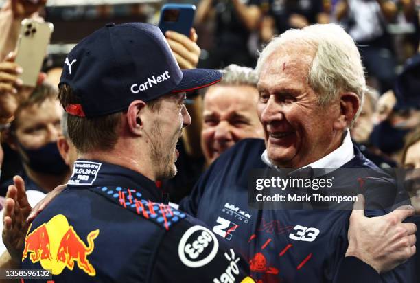 Race winner and 2021 F1 World Drivers Champion Max Verstappen of Netherlands and Red Bull Racing celebrates with Red Bull Racing Team Consultant Dr...