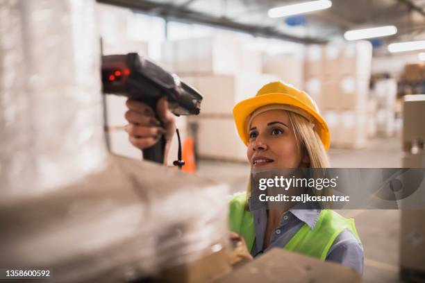 working together in a warehouse - scan barcode stock pictures, royalty-free photos & images