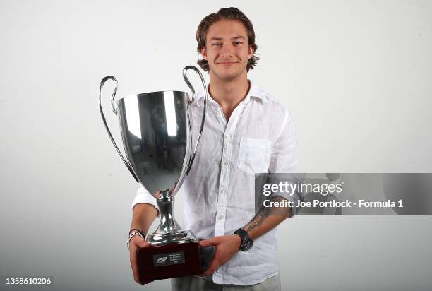 Champion Dennis Hauger of Norway and Prema Racing poses for a portrait after the feature race of Round 8:Yas Island of the Formula 2 Championship at...