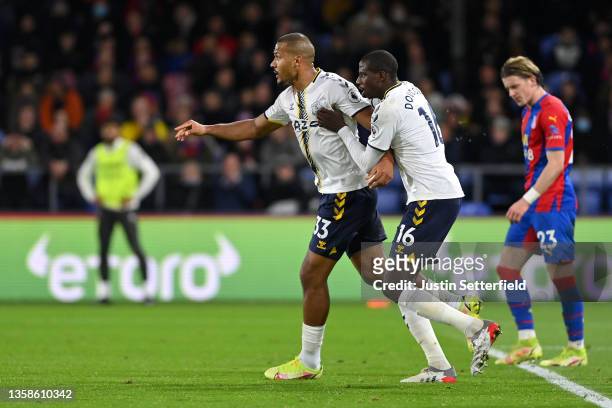 Jose Salomon Rondon of Everton celebrates after scoring their side's first goal with Abdoulaye Doucoure during the Premier League match between...
