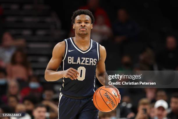 Bronny James of the Sierra Canyon Trailblazers handles the ball during the Hoophall West tournament against the Perry Pumas at Footprint Center on...