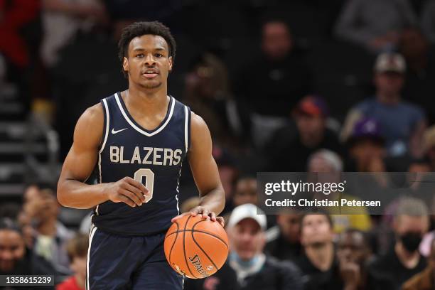 Bronny James of the Sierra Canyon Trailblazers handles the ball during the Hoophall West tournament against the Perry Pumas at Footprint Center on...