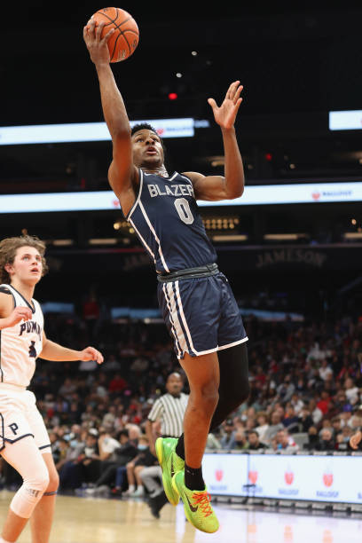 Bronny James of the Sierra Canyon Trailblazers attempts a shot during the Hoophall West tournament against the Perry Pumas at Footprint Center on...