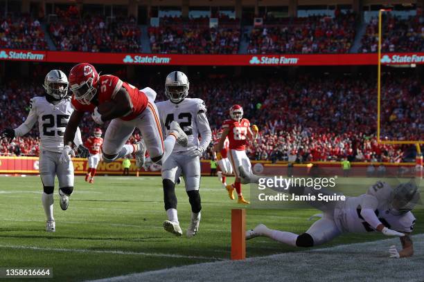 Darrel Williams of the Kansas City Chiefs dives across the goal line for a touchdown during the first quarter against the Las Vegas Raiders at...