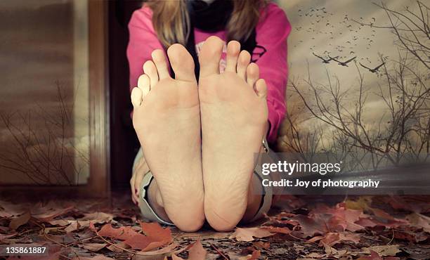 autumn - barefoot soles female stock pictures, royalty-free photos & images