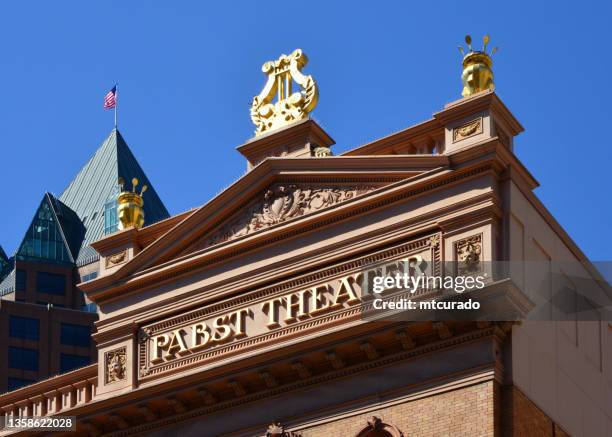 pabst theater - gilde lyre and terracota sign (1895), milwaukee, wisconsin, usa - frontão triangular imagens e fotografias de stock