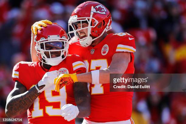 Josh Gordon of the Kansas City Chiefs celebrates with Travis Kelce after scoring a touchdown during the second quarter against the Las Vegas Raiders...