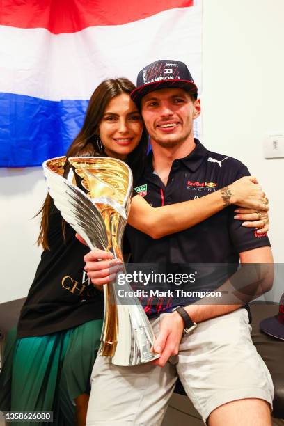 Race winner and 2021 F1 World Drivers Champion Max Verstappen of Netherlands and Red Bull Racing celebrates with his girlfriend Kelly Piquet and his...