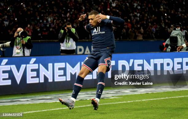 Kylian Mbappe of Paris Saint-Germain celebrate his first goal with teammates during the Ligue 1 Uber Eats match between Paris Saint Germain and AS...