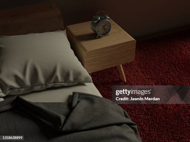 bedroom with bed and sheet and alarm clock - digital clock bildbanksfoton och bilder