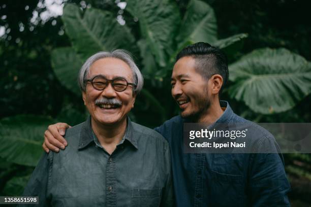 senior father and adult son having a good time, japan - asian man potrait bildbanksfoton och bilder