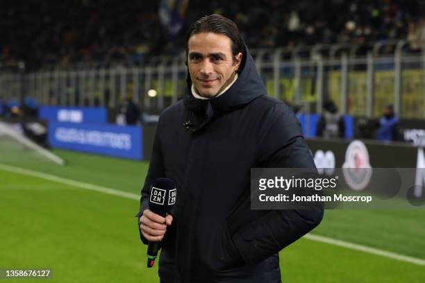 Former footballer Alessandro Matri now a commentator for DAZN pictured holding sa branded microphone during the Serie A match between FC...