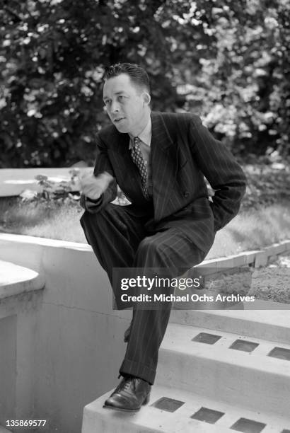 Albert Camus in the garden of his Paris studio, 1952.