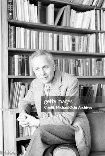 Louis Aragon, French writer and editor, in his office at the Paris newspaper 'Ce Soir', 1952.