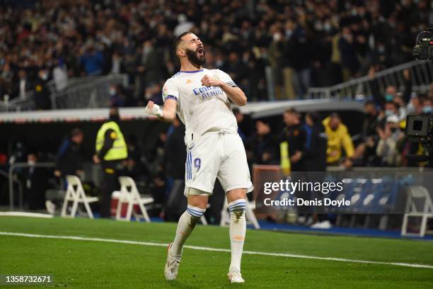 Karim Benzema of Real Madrid celebrates after scoring their team's opening goal during the La Liga Santander match between Real Madrid CF and Club...